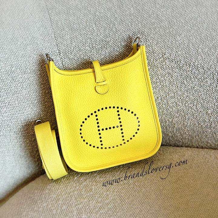 (Brand new) Hermes Mini Evelyne 16 in Limoncello Clemence Leather, Canvas Strap and PHW